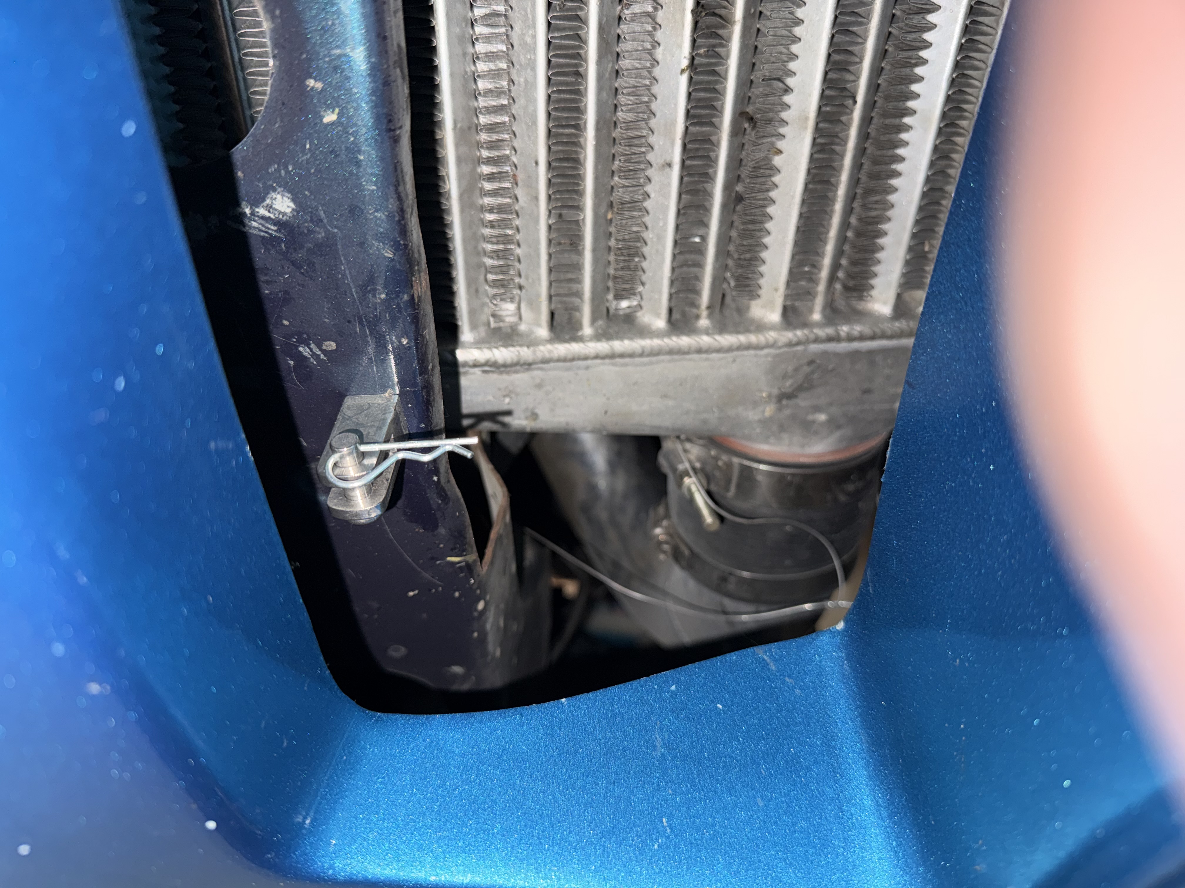 1995-nissan-240sx-s14-front-splitter-support-rod-mount-closeup
