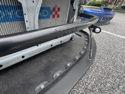 Doryoku front crash bar supporting splitter rods on a 1999 Honda Civic Si