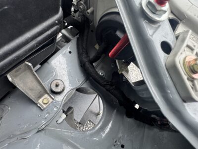Upper chassis fastener for a side splitter support rod on a 1999 Honda Civic Si