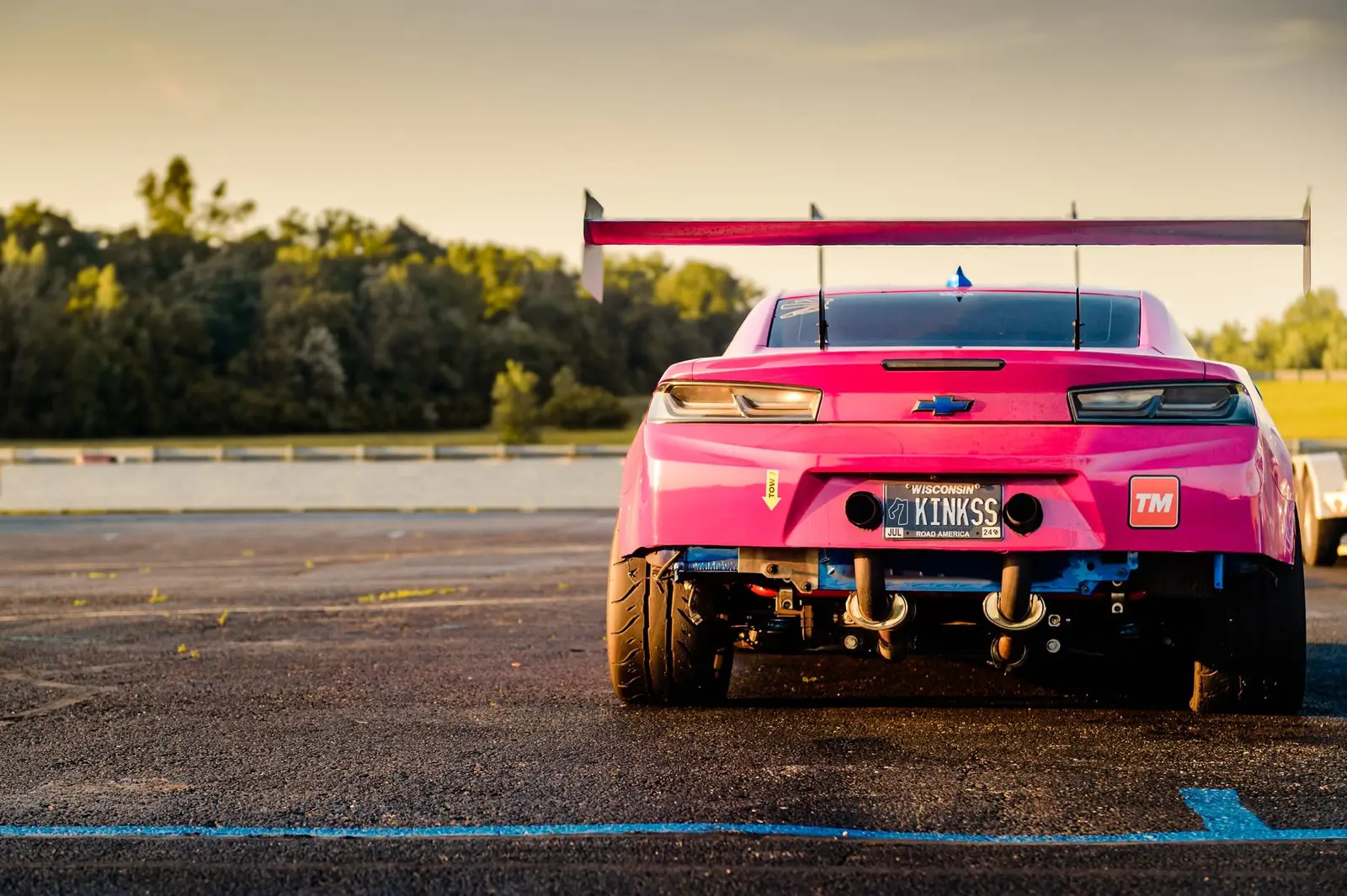 Bright pink track-prepared Chevrolet Camaro at Road America for the Professional Awesome Racing Technical Forum