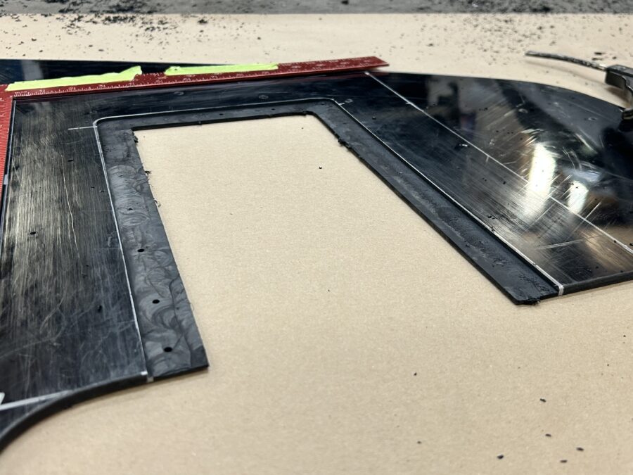 ABS splitter blade with a rectangular diffuser cutout and layout marks for Drew’s 1989 BMW E30 325is.